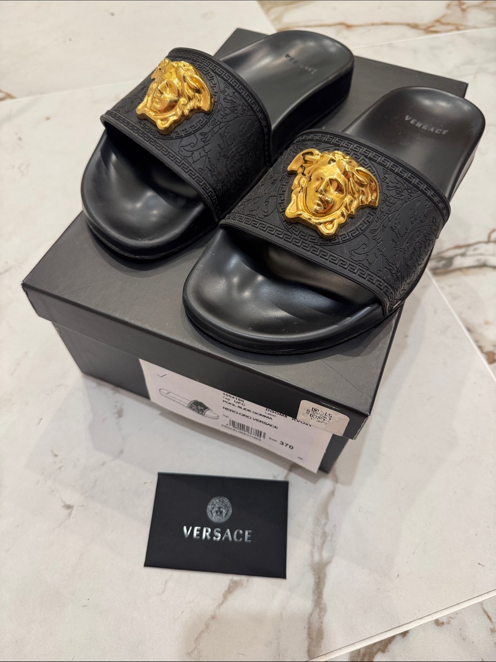 Versace Black Slides with Gold Medusa Accent